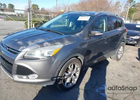 2014 Ford Escape Titanium z USA, uszkodzony, nr VIN 1FMCU0JX6EUC27993